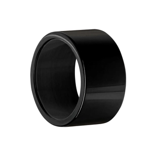 Detailed macro view of 12mm wide polished black punk ring with smooth mirror finish