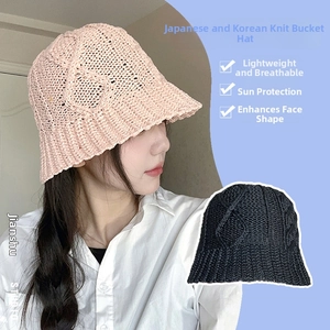 Detail of breathable hollow knit sun hat featuring pink and black handmade crochet patterns