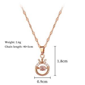 Detailed specs of rose gold crown necklace with dimensions 1.8x0.9cm and 2.6g weight