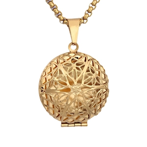 Vintage gold hollow round locket necklace with intricate geometric patterns in stainless steel