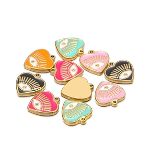 Colorful heart-shaped Evil Eye charms with vibrant enamel finish and gold metal edges