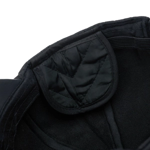 Macro detail of men's winter baseball cap showing thick padded lining and elastic band
