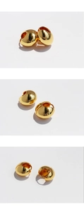 Detailed three-way view of high-shine 24k gold plated oval drop hoop earrings