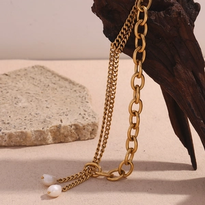 Close-up of double-layered 18K gold plated chain necklace with elegant freshwater pearls