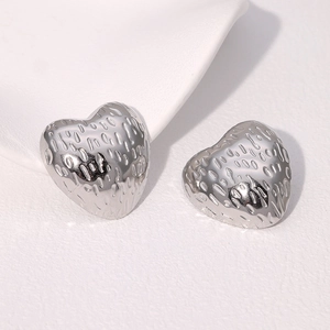 Minimalist silver titanium steel heart earrings with unique hammered texture for women
