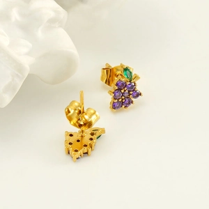 Minimalist gold grape earrings with purple and green cubic zirconia in a top view