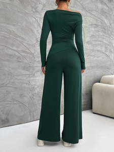 Rear view of dark green off-shoulder top and wide leg pants set with soft fabric