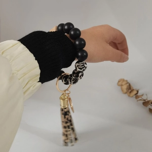 Silicone beaded wristlet keychain with leopard print tassel and matte black beads