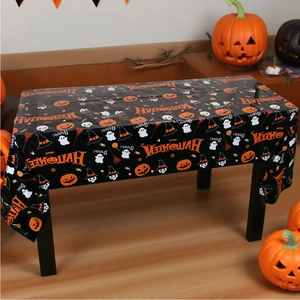 Waterproof Halloween table cover with pumpkins and ghosts on a black rectangular background