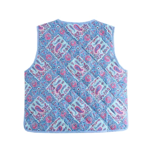 Detailed back view of a quilted cotton vest with colorful paisley patterns and stitching