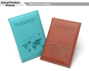 Detailed view of PU leather passport covers featuring embossed world map and airplane patterns
