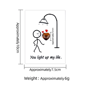 Natural heart gemstone on card with You light up my life text and size specs