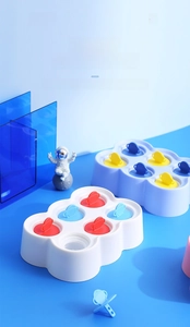Cloud-shaped silicone popsicle mold with planet handles made of food-grade PP material