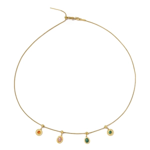 Detailed view of gold chain necklace featuring four colorful gemstone heart pendants