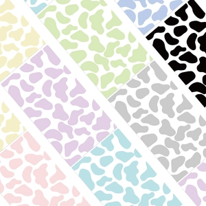 Detail of waterproof cow print phone stickers in various pastel colors and patterns
