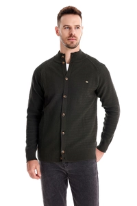 Detail of dark olive green cardigan showing knit texture, stand collar, and button closure