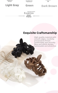 Detail of matte flower hair claws in light grey, green and dark coffee finishes