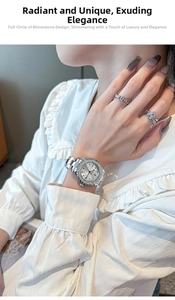 Silver women's watch with rhinestone bezel worn by a model with elegant accessories