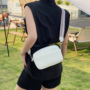 White litchi pattern leather small square bag with a stylish wide woven shoulder strap