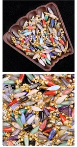 Macro view of multi-color faceted stone bullet pendants with gold plating for DIY jewelry