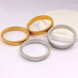 Set of four elastic gold and silver 18K stainless steel textured bracelets for women