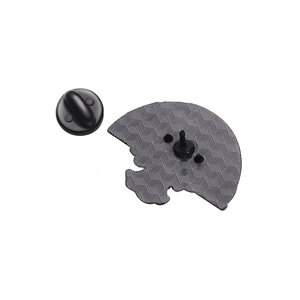 Rainbow ghost enamel pin back view with textured black metal and rubber clutch