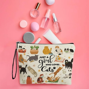Canvas cat makeup bag with 'Just a Girl Who Loves Cats' print and wristlet strap