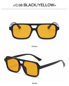 Detail view of double bridge sunglasses with black frames and yellow lenses C.08