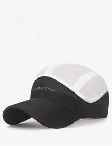 Close-up of black and white sports cap with breathable mesh and curved brim design