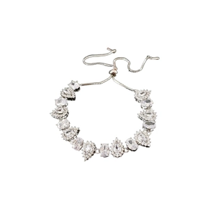 Elegant silver bolo bracelet with pear and oval cut zircons on a white background