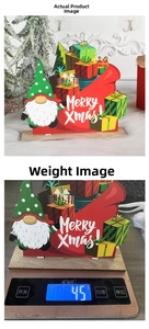 DIY Christmas wooden ornament featuring Santa and Merry Xmas text on a digital scale