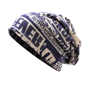 Street style cream knitted beanie with navy blue punk typography and underground letter prints