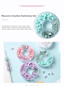 Vue macro d'un kit de papeterie macaron avec pinces à dessin et punaises en boîte ronde