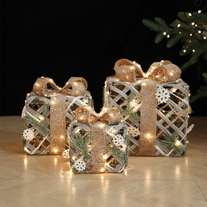 Three champagne wire Christmas gift boxes with bows and warm LED lights for tabletop decor