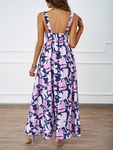 Detail of summer beach dress showing the smocked elastic back and floral print pattern