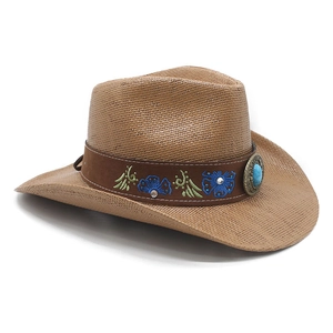 Detail of a brown straw cowboy hat with an embroidered turquoise decorative band