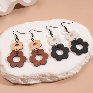 Bohemian hollow wood flower drop earrings in brown and black on white stone