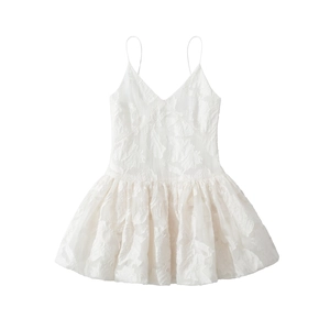 White V-neck sleeveless dress with textured floral fabric and flared pleated hemline