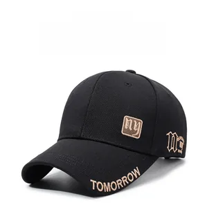 Detail of NY embroidered black baseball cap with side lettering and patch details