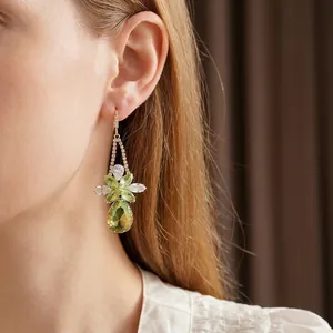 Elegant gold earrings with light green zircon flower drops and marquise crystals