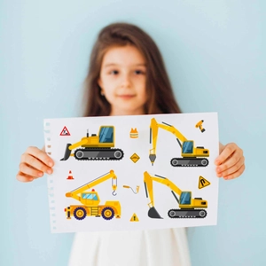 Children holding yellow construction truck stickers featuring excavators and cranes