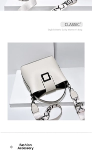 Detail of off-white bucket bag featuring lychee texture PU leather and black square buckle