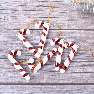 Set of 6 red and white plastic Christmas candy cane hanging ornaments with gold strings