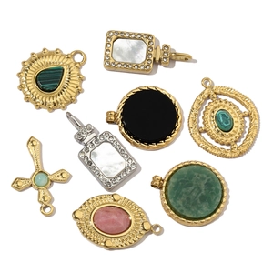 Assorted gold and silver stainless steel pendants with natural stones and crystals