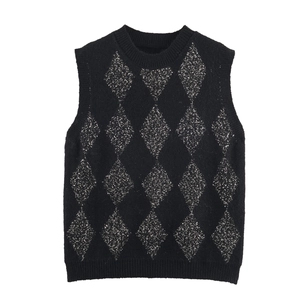 Women's black knitted vest featuring silver diamond sequin patterns on a white background