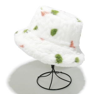 Plush faux rabbit fur bucket hat with colorful polka dots on a white base for winter