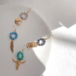 Bohemian vintage natural stone earrings set featuring turquoise and bull head charms