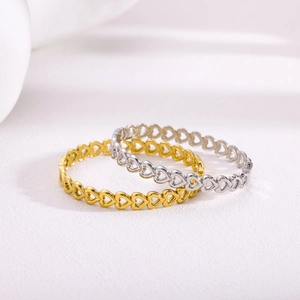 Elegant minimalist hollow heart stainless steel rings in gold and silver finishes