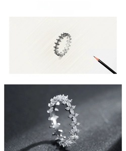Macro detail of S925 silver ring featuring marquise and round cut brilliant diamonds