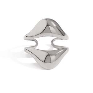 Macro view of silver lava-style double-layered stainless steel ring with fluid lines